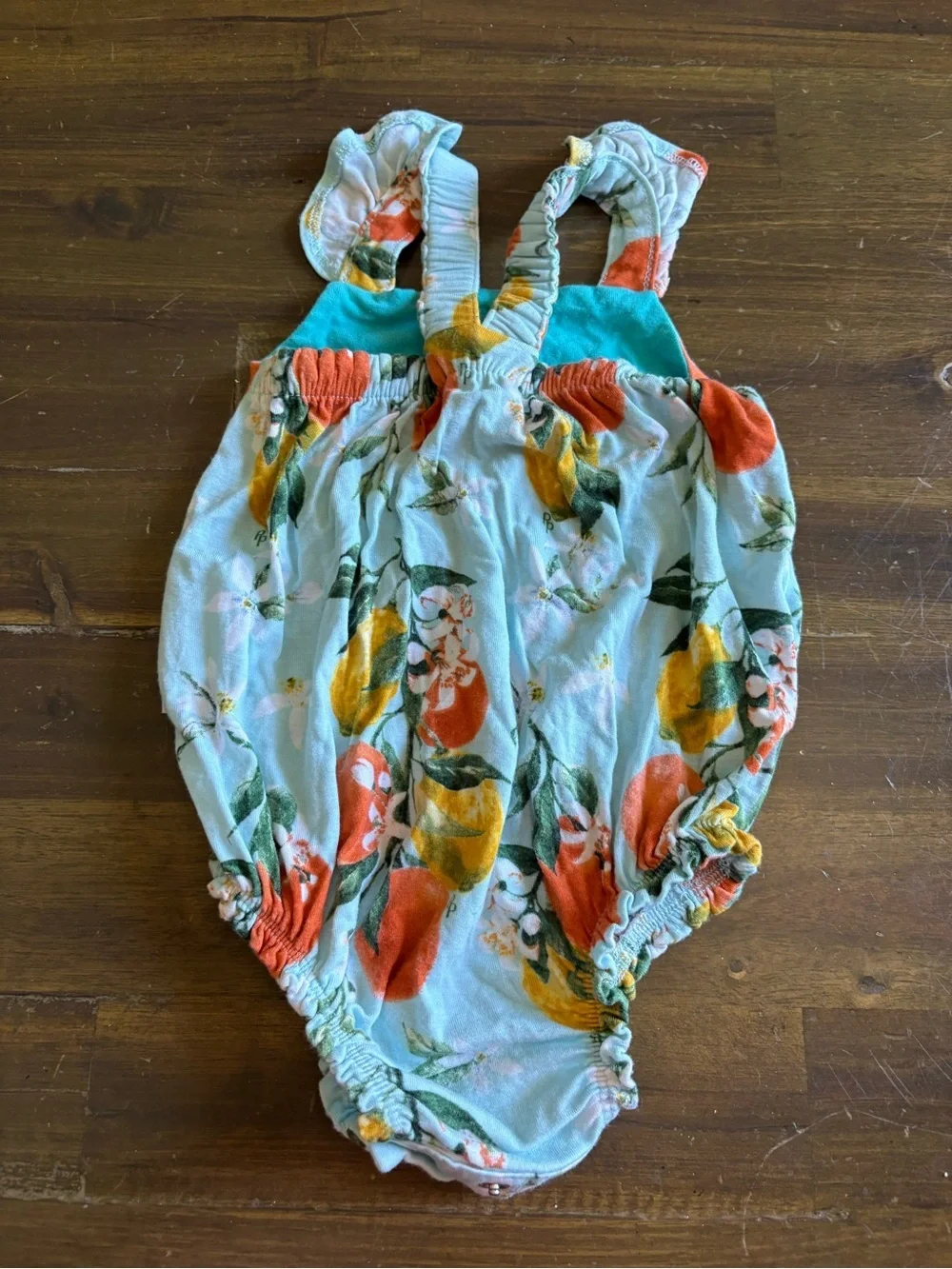Posh Peanut Mirabella Henley Ruffled Capsleeve Bubble Romper Citrus Print Orange